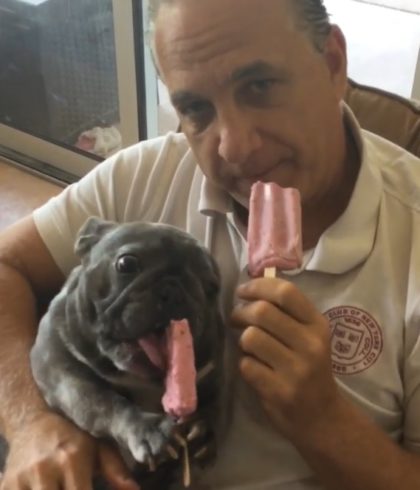 Pup who Eats with his Paws Loves Having Snack Time with Dad