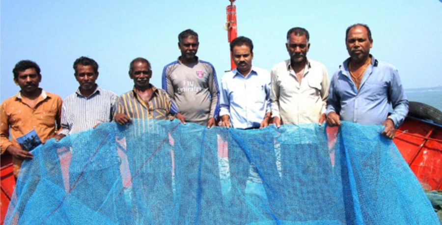 Indian fishers catch plastic to save the seas and rebuild roads