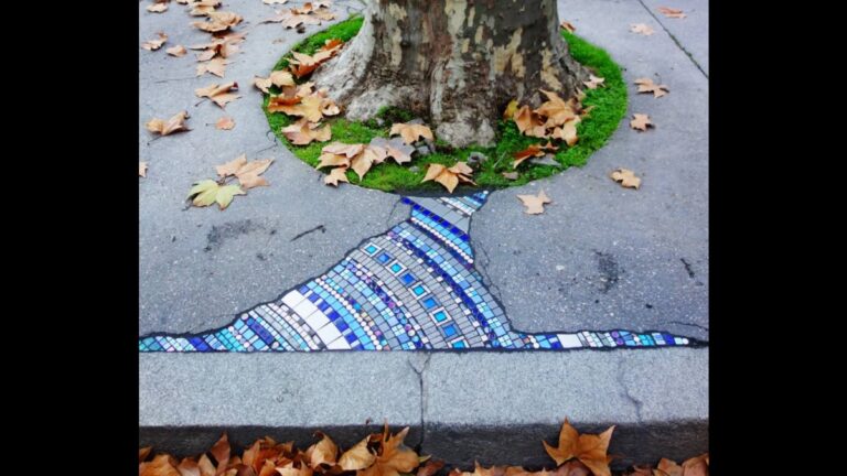 Artist Transforms Cracked Walls and Sidewalks with Colorful Mosaics