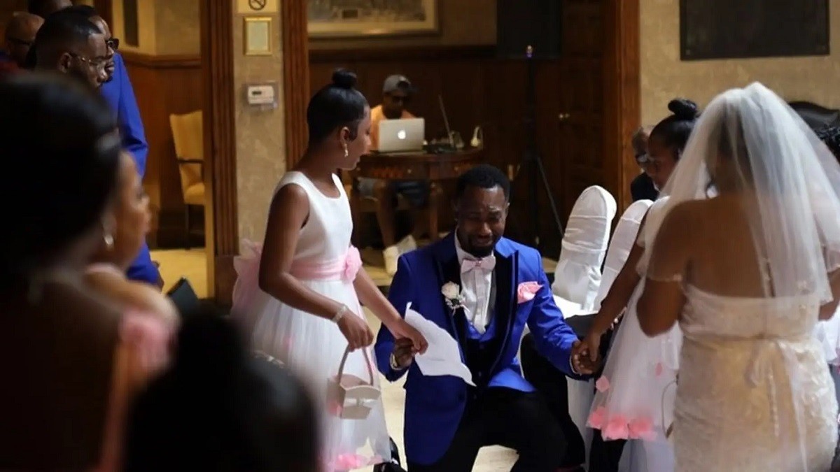 Groom delivers adoption vows to stepdaughters at wedding