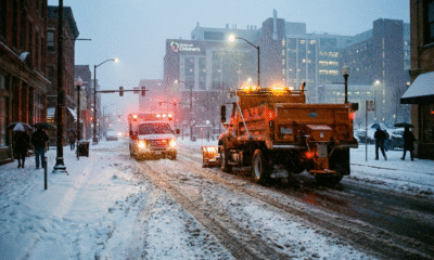Snowplow Driver Guides Ambulance Through Storm