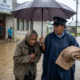 Officer Rescues Shivering Elder from Flood Rain